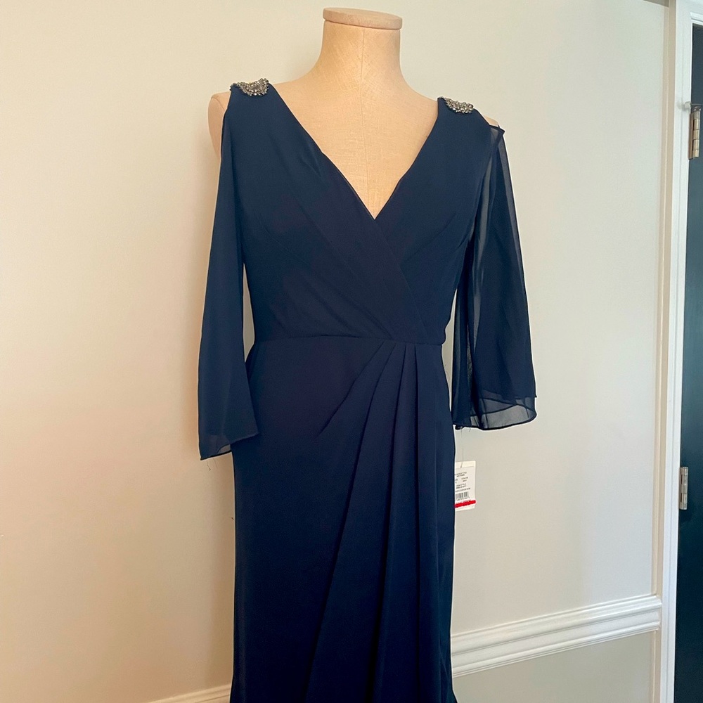 NWT David’s Bridal Navy crepe gown with sequin accents on shoulders.
